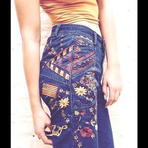 Spell embroidered wanderlust flare jeans